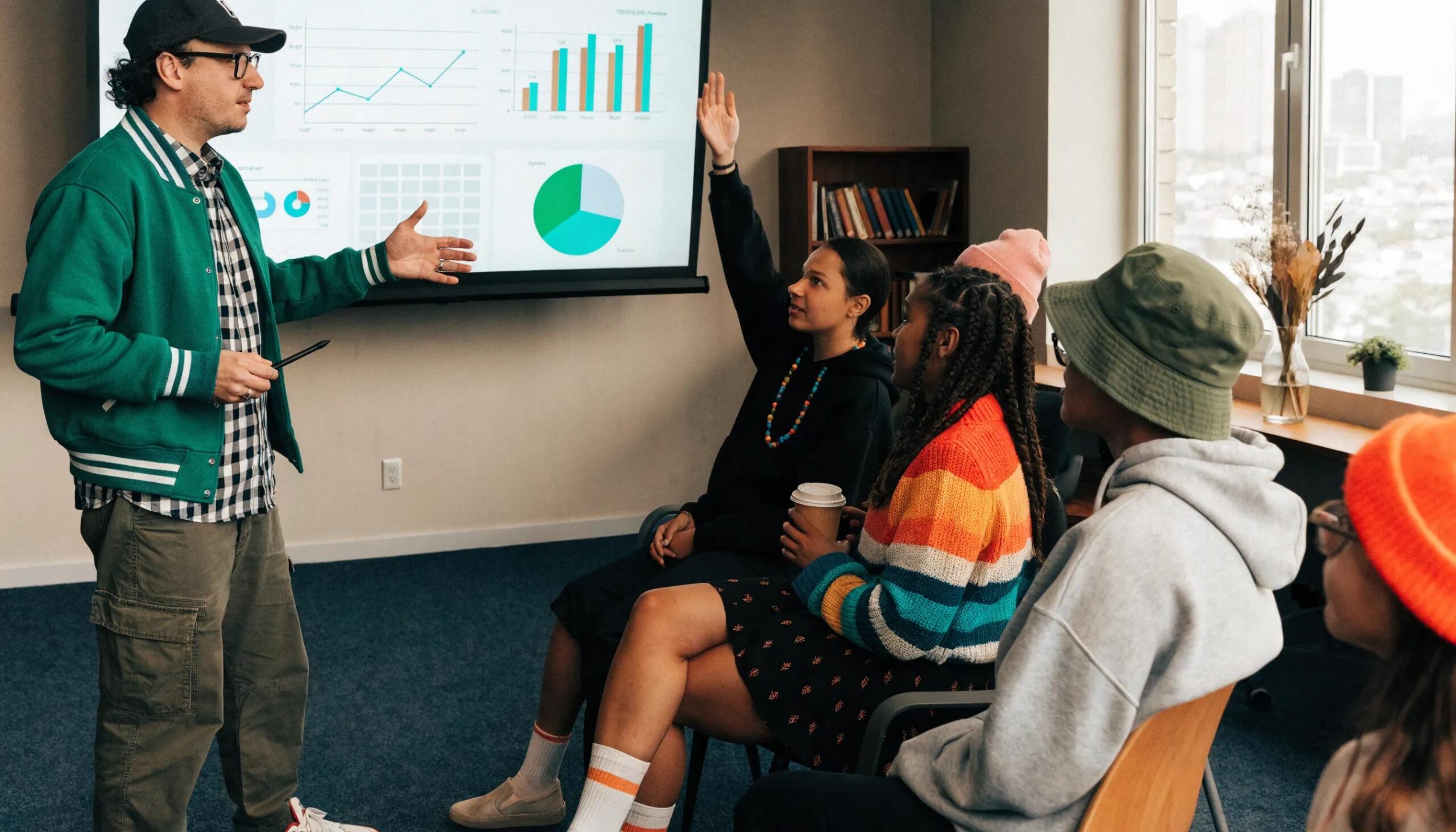 A coach teaching successful PPC strategies in a classroom setting